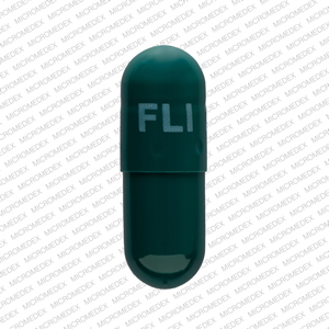 Pill FLI 28 mg Green Capsule/Oblong is Memantine Hydrochloride Extended Release