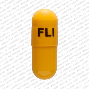 Pill FLI 7 mg Yellow Capsule-shape is Memantine Hydrochloride Extended Release