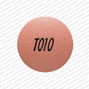 Pill T010 Pink Round is Nifedipine Extended-Release