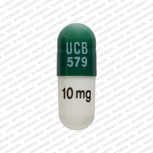 Pill UCB 579 10 mg Green & White Capsule-shape is Methylphenidate Hydrochloride Extended-Release (CD)