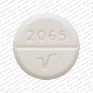 Pill 2065 V 4 White Round is Acetaminophen and Codeine Phosphate