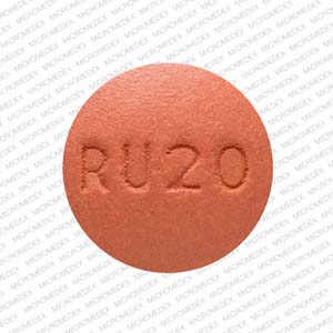 Pill RU20 Pink Round is Rosuvastatin Calcium