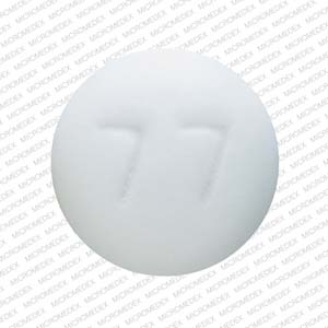 Pill 77 1140 White Round is Acamprosate Calcium Delayed-Release