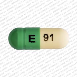 IX 658 Pill Green & White Capsule/Oblong - Pill Identifier