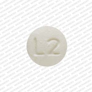 Pill L2 Yellow Round is Larin 24 Fe