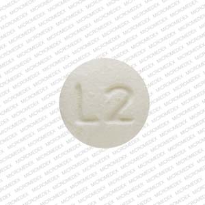 Pill L2 Yellow Round is Larin Fe 1/20