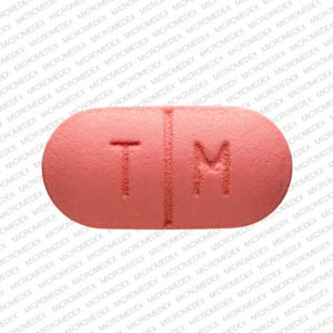 Pill T M 500 Pink Elliptical/Oval is Tinidazole