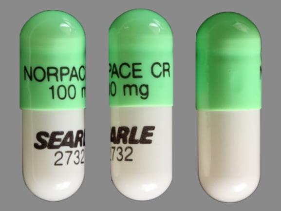 Pill NORPACE CR 100 mg SEARLE 2732 Green Capsule-shape is Norpace CR