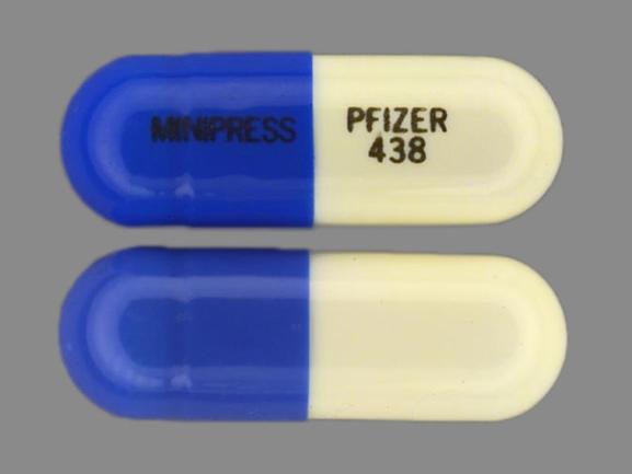 Pill MINIPRESS PFIZER 438 Blue & White Capsule/Oblong is Minipress