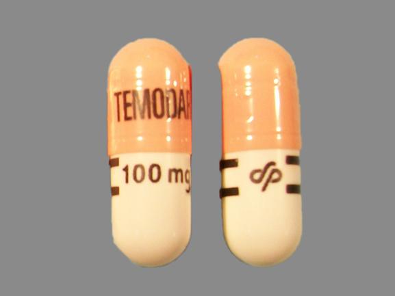 Pill TEMODAR 100 mg Logo Pink & White Capsule-shape is Temodar