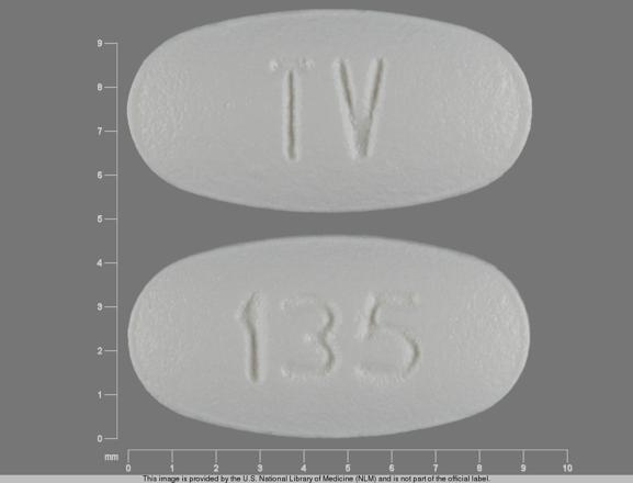 Pill TV 135 White Oval is Carvedilol