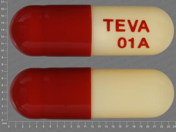 Pill TEVA 01A Red & White Capsule-shape is Aspirin and Extended-Release Dipyridamole