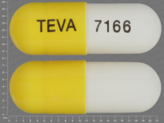 Pill TEVA 7166 White & Yellow Capsule/Oblong is Celecoxib