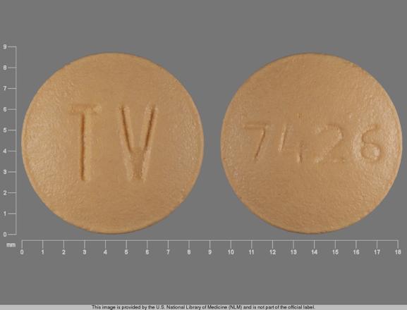 Pill TV 7426 Beige Round is Montelukast Sodium