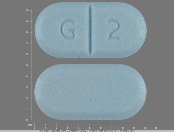 Pill G 2 Blue Capsule/Oblong is Glyburide (Micronized)