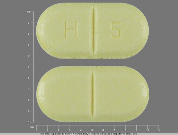 Pill H 5 Yellow Elliptical/Oval is Glyburide (Micronized) .