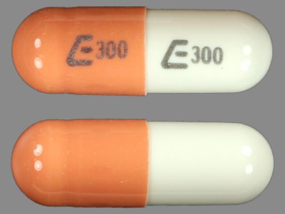 Pill E300 E300 Tan & White Capsule/Oblong is Nizatidine