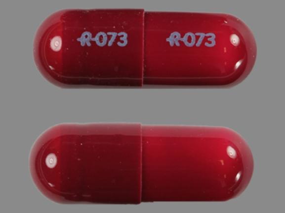 Pill R-073 R-073 Maroon Capsule/Oblong is Oxazepam