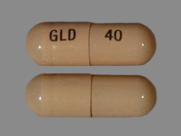 Pill GLD 40 Beige Capsule/Oblong is Oracea