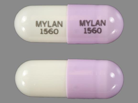 Pill MYLAN 1560 MYLAN 1560 Purple Capsule/Oblong is Phenytoin Sodium Extended