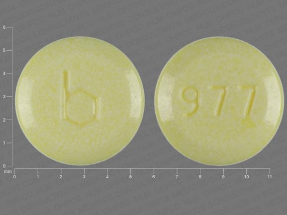 Pill b 977 Yellow Round is Junel 1/20