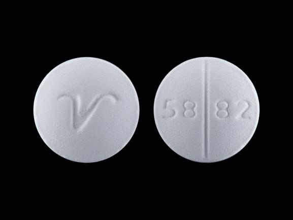 Pill 58 82 V White Round is Spironolactone