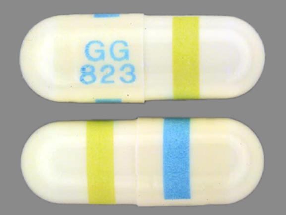 Pill GG 823 GG 823 White Capsule/Oblong is Clomipramine Hydrochloride