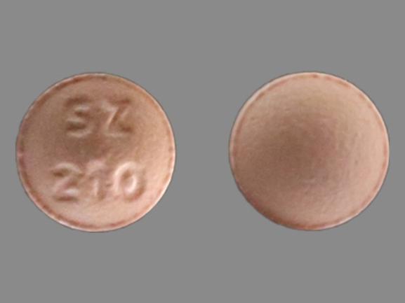 Pill SZ 210 Pink Round is Losartan Potassium