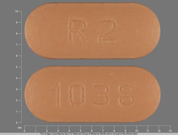 Pill R 2 1038 Orange Capsule/Oblong is Risperidone