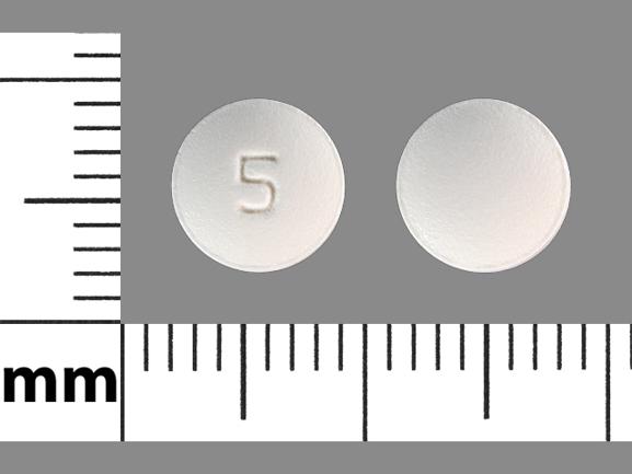 Pill 5 White Round is Donepezil Hydrochloride