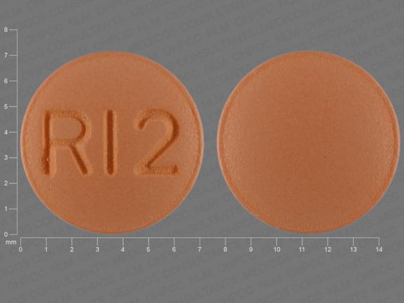 Pill RI2 Orange Round is Risperidone