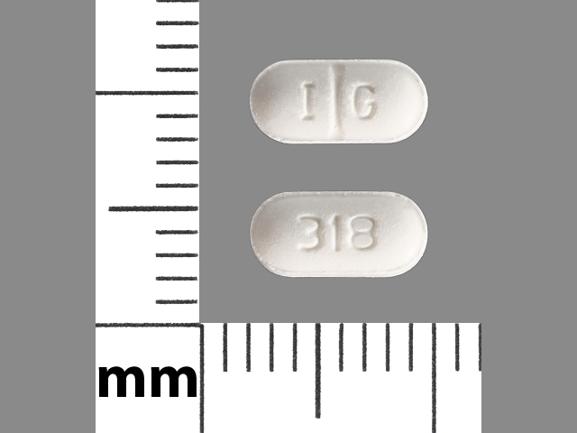 Pill I G 318 White Capsule/Oblong is Benztropine Mesylate