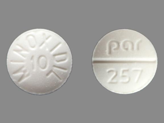 Pill MINOXIDIL 10 Par 257 White Round is Minoxidil