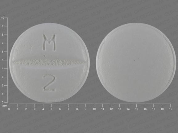 M 2 Pill White Round 9mm - Pill Identifier