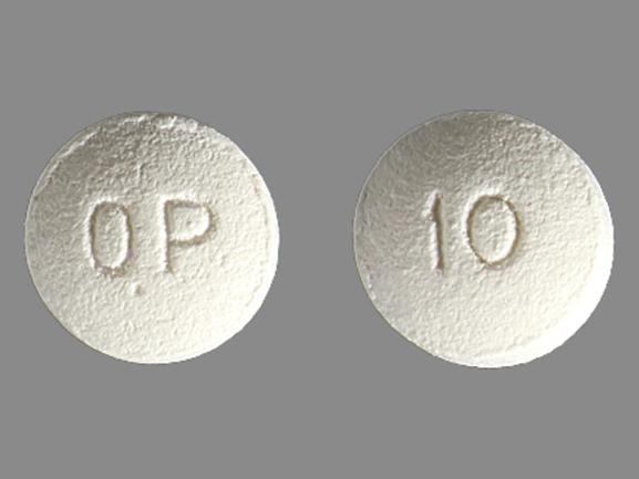 Pill OP 10 White Round is OxyContin