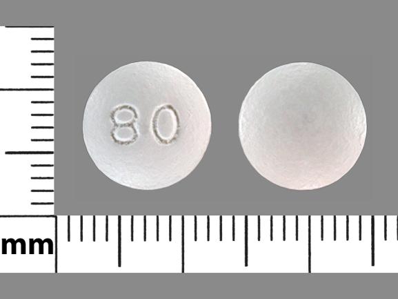 Pill 80 White Round is Atorvastatin Calcium