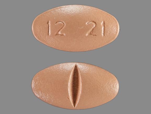Pill 12 21 Beige Oval is Fluvoxamine Maleate