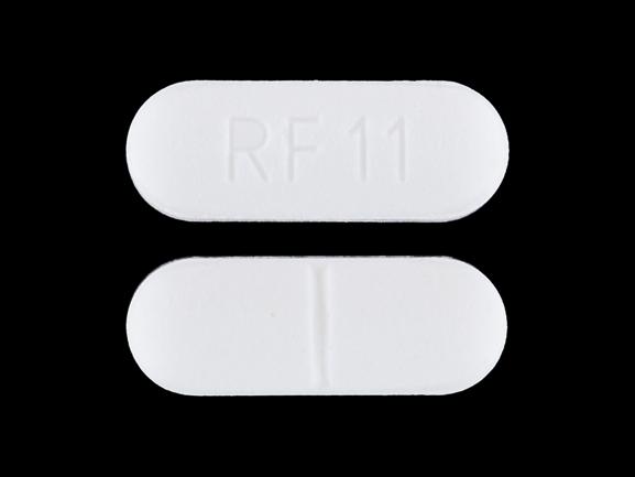 Pill RF 11 White Capsule-shape is Metoclopramide Hydrochloride.