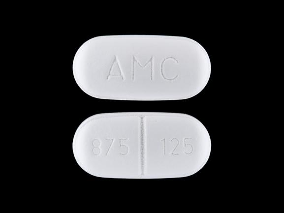 Pill 875 125 AMC White Oval is Amoxicillin and Clavulanate Potassium