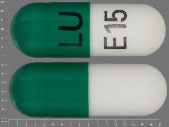 Pill LU E15 Green & White Capsule/Oblong is Amlodipine Besylate and Benazepril Hydrochloride