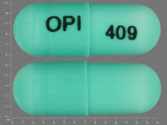 Pill OPI 409 Green Capsule-shape is Chlordiazepoxide Hydrochloride and Clidinium Bromide