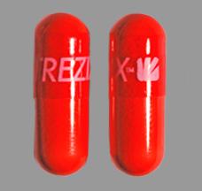 Pill TREZIX Red Capsule/Oblong is Acetaminophen, Caffeine and Dihydrocodeine Bitartrate