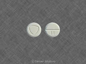 Pill 11 Triangle Logo White Round is Akineton HCl