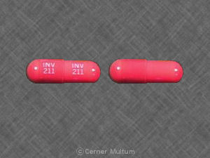Pill INV 211 INV 211 Red Capsule-shape is Amantadine Hydrochloride
