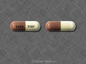 Pill 93 3107 93 3107 Tan & White Capsule-shape is Amoxicillin