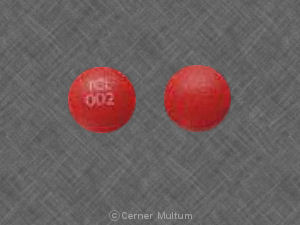 Pill TCL 002 Red Round is Aspirin Enteric Coated