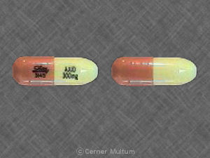 Pill Lilly 3145 AXID 300 mg Orange & Yellow Capsule/Oblong is Axid Pulvules
