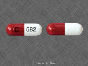Pill C 582 Red & White Capsule/Oblong is Cefadroxil Hemihydrate