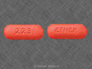 Pill 223 ETHEX Red Elliptical/Oval is Codeine Phosphate and Guaifenesin