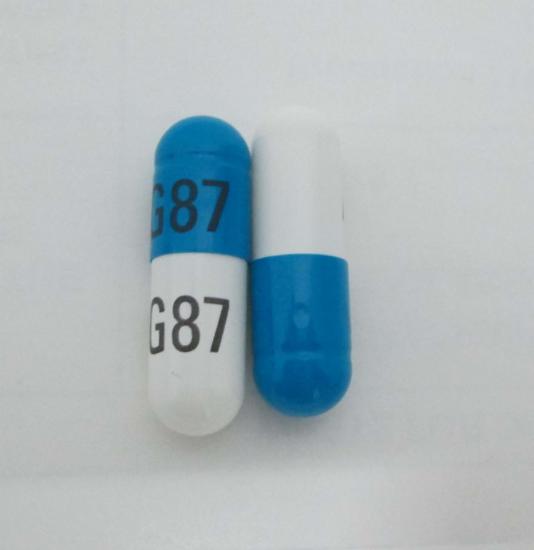 Pill RG87 RG87 Blue & White Capsule/Oblong is Diltiazem Hydrochloride Extended-Release